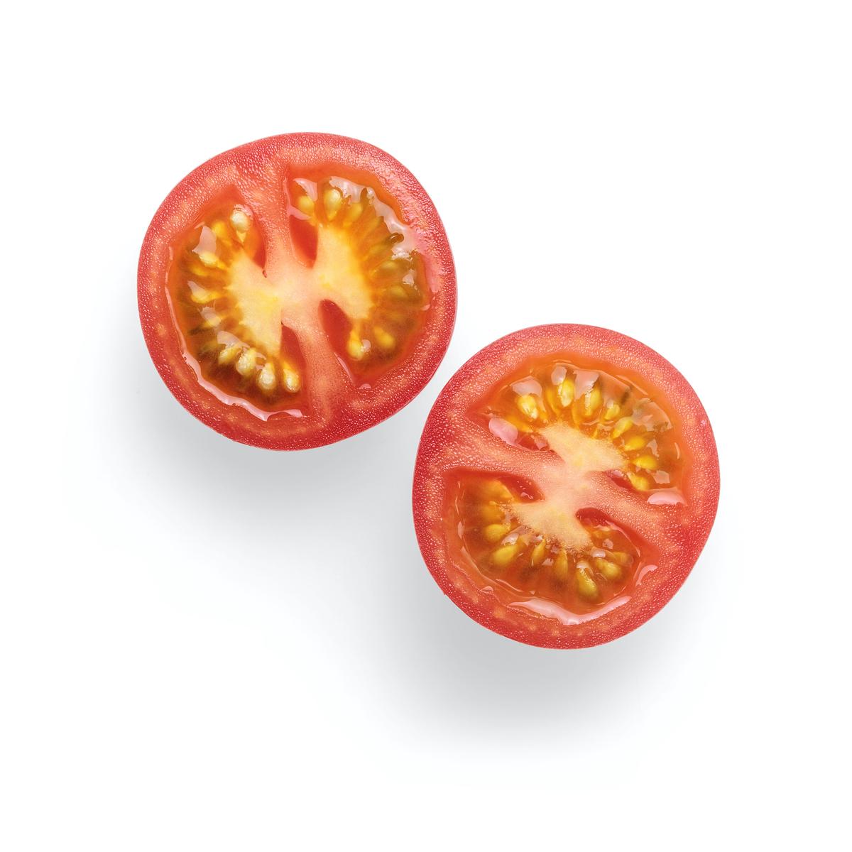 Image of tomato seeds on a white background ready for planting